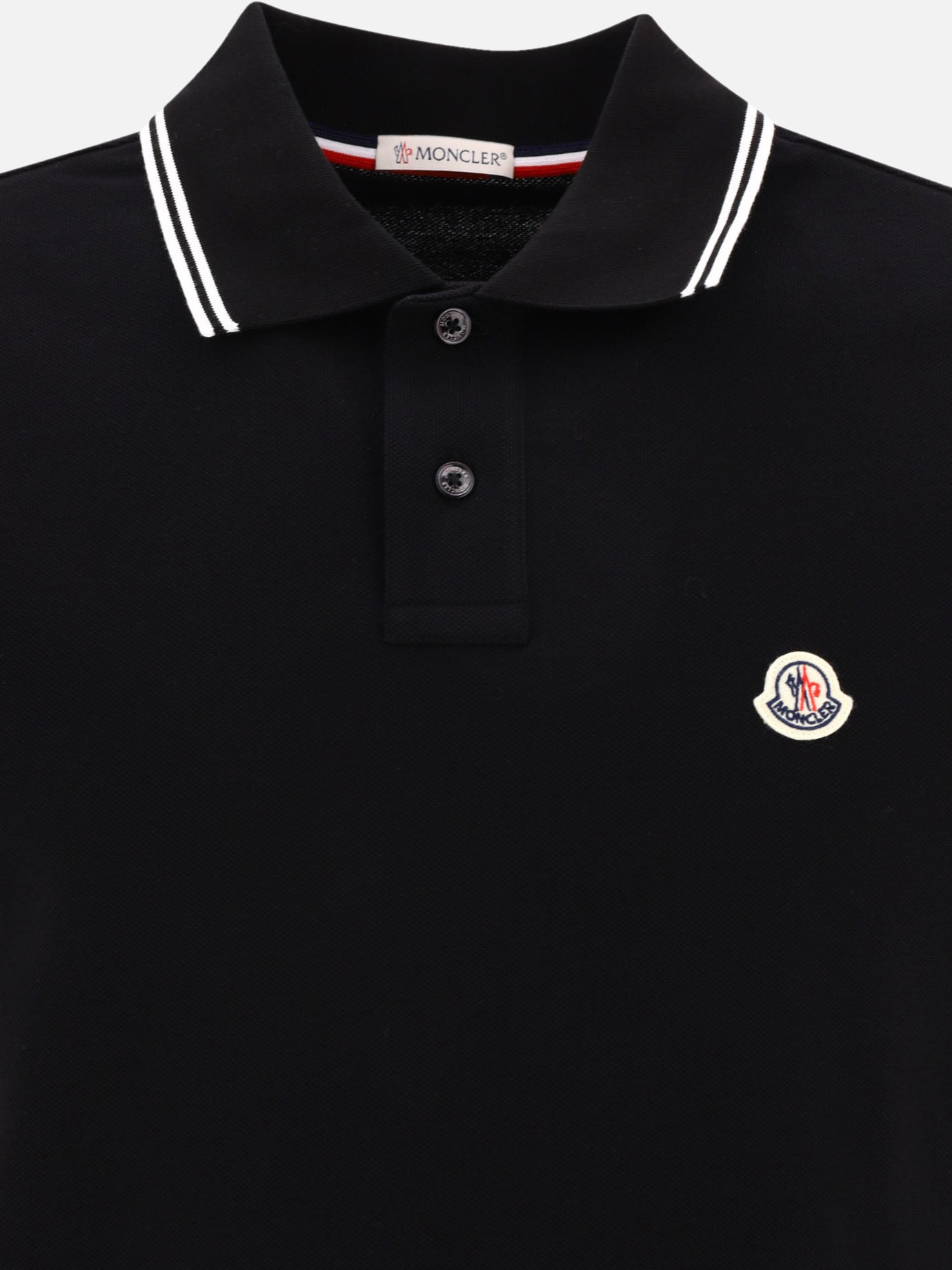 Polo shirt with logo patch