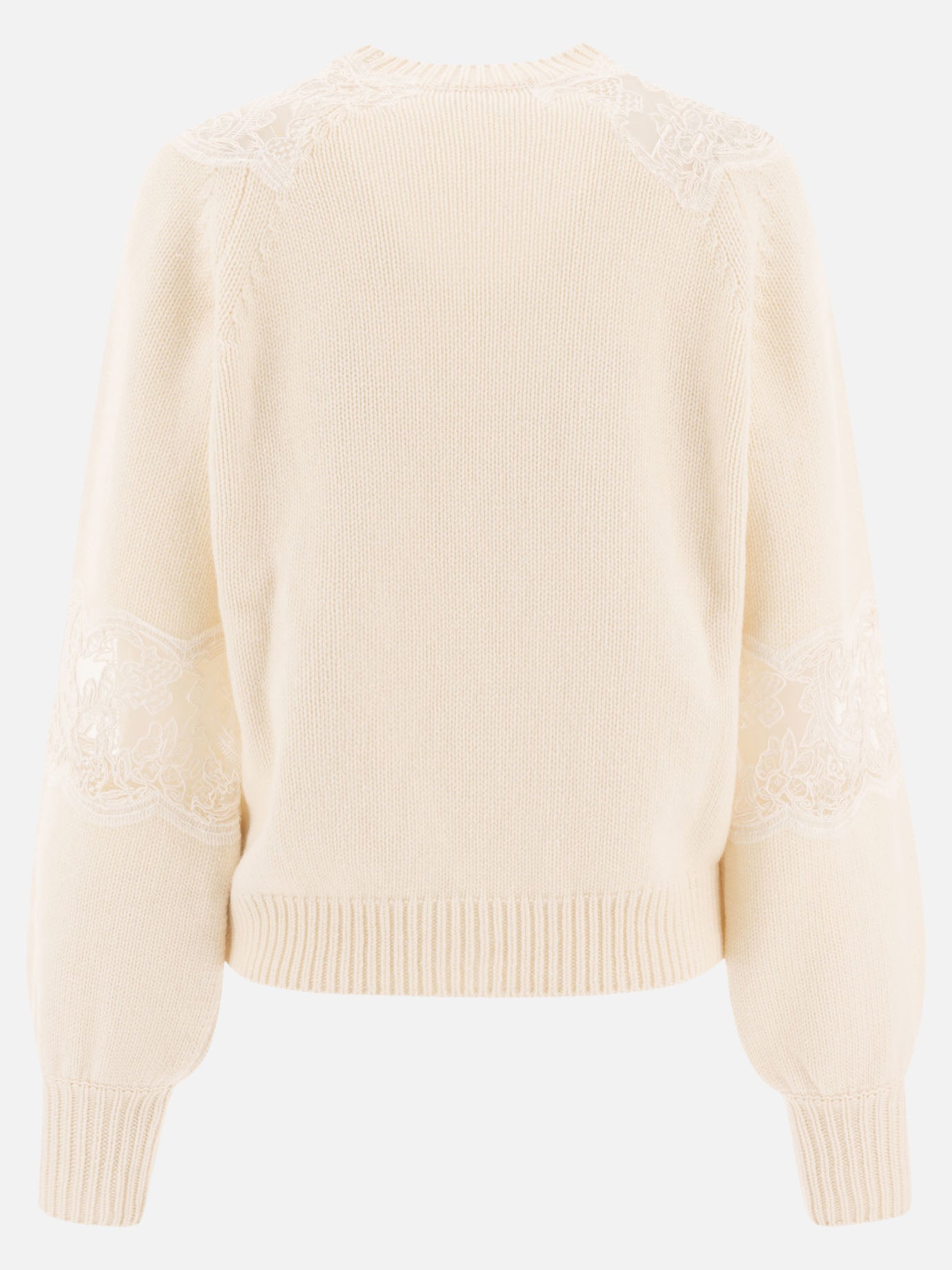 Sweater with lace inserts