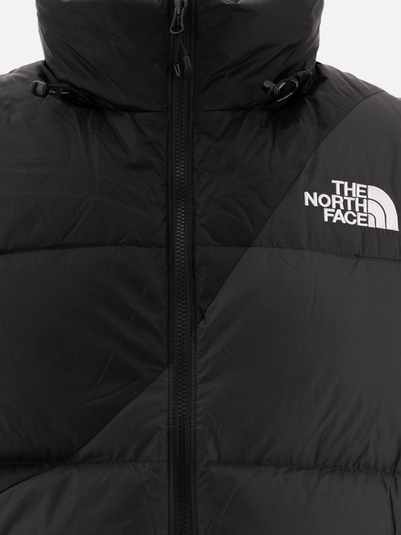 "TNF X Yinka Ilori" down vest